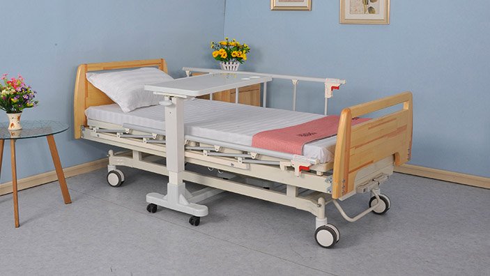 Medical bed with mobile dining table